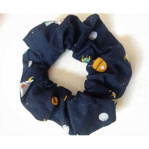 blue scrunchie with spaceship print