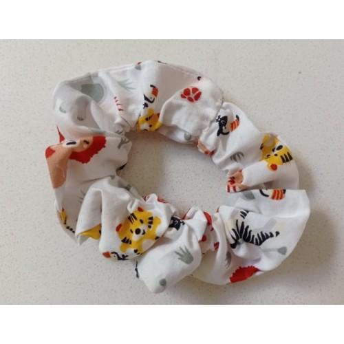 white scrunchie with zoo animal print